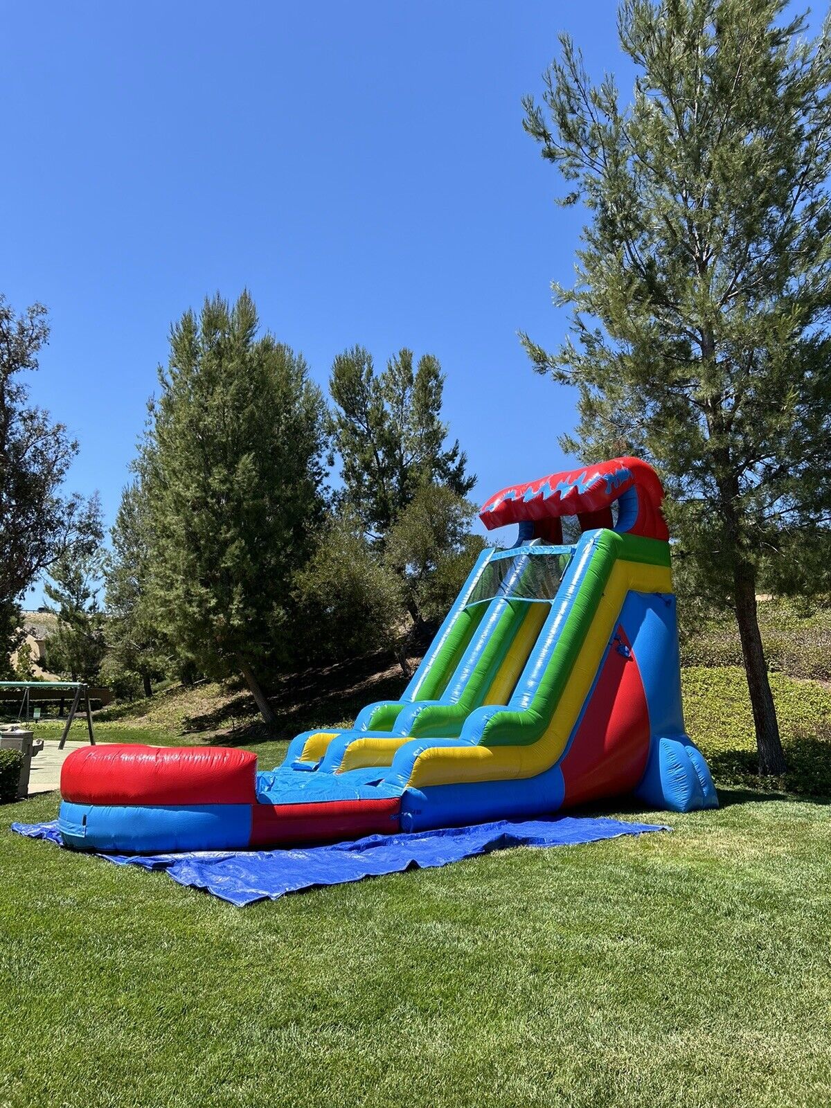 18ft COMMERCIAL GRADE FIESTA INFLATABLE WATERSLIDE 1.5hp,POOL & BUMPER INCLUDED.