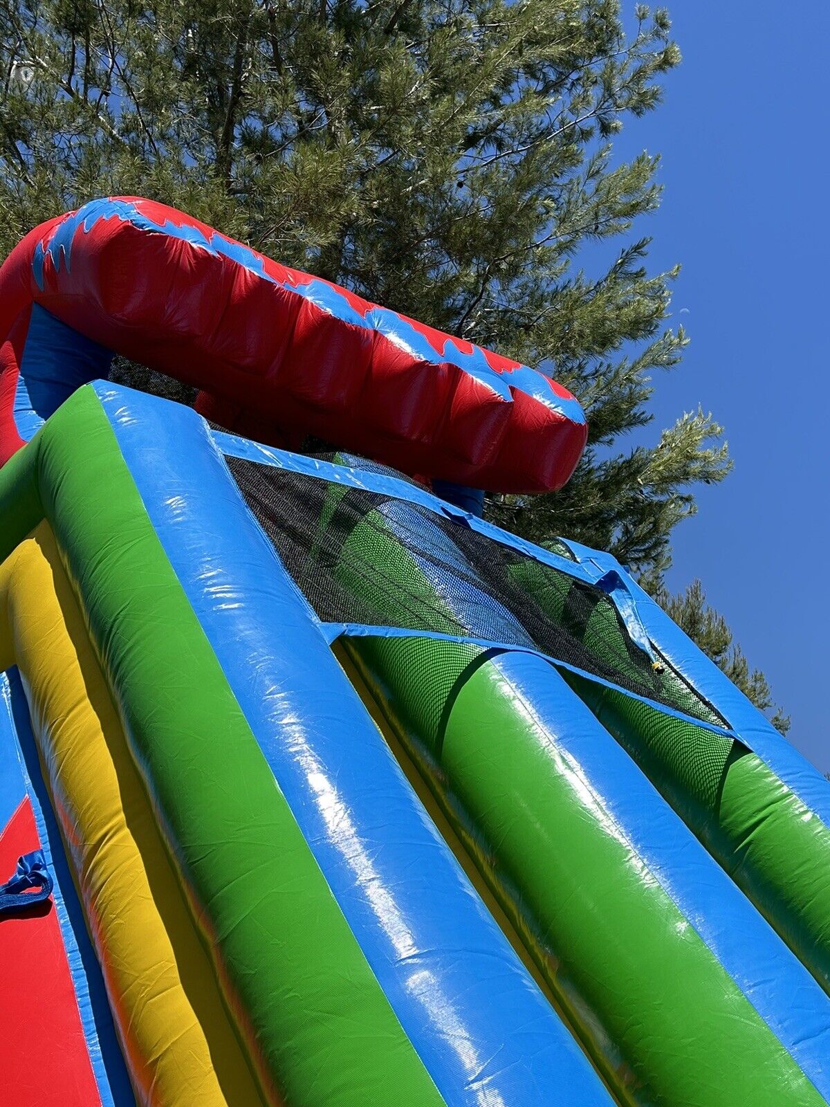 18ft COMMERCIAL GRADE FIESTA INFLATABLE WATERSLIDE 1.5hp,POOL & BUMPER INCLUDED.