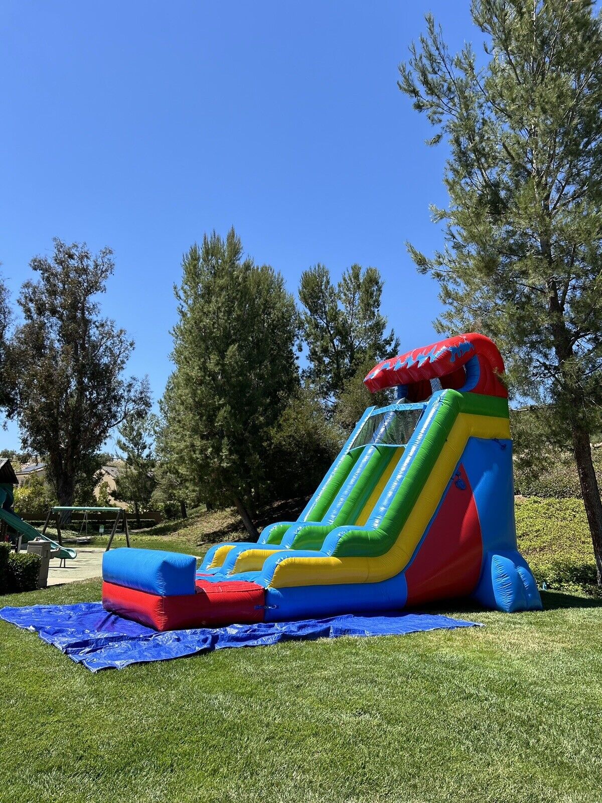 18ft COMMERCIAL GRADE FIESTA INFLATABLE WATERSLIDE 1.5hp,POOL & BUMPER INCLUDED.