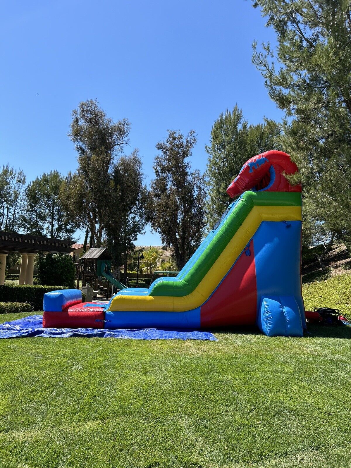 18ft COMMERCIAL GRADE FIESTA INFLATABLE WATERSLIDE 1.5hp,POOL & BUMPER INCLUDED.